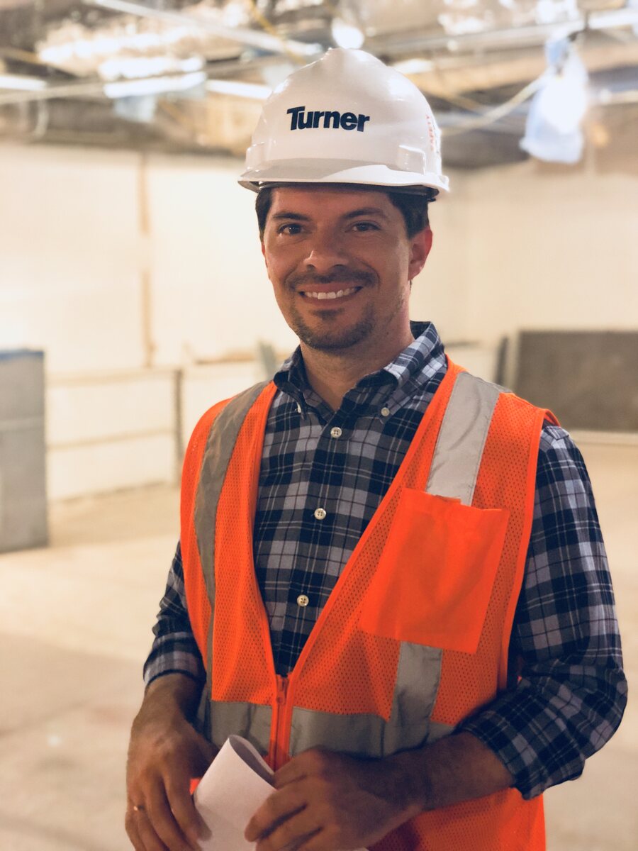 Leo D&rsquo;Cruz in hard hat and safety vest inside the Union Terminal restoration site
